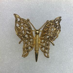 Vintage Monet gold tone filigree butterfly brooch